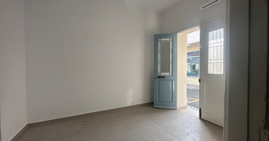 Exclusive Listing, Renovated Building offering ground level and upper level residences with garage in prime location Agia Zoni.
