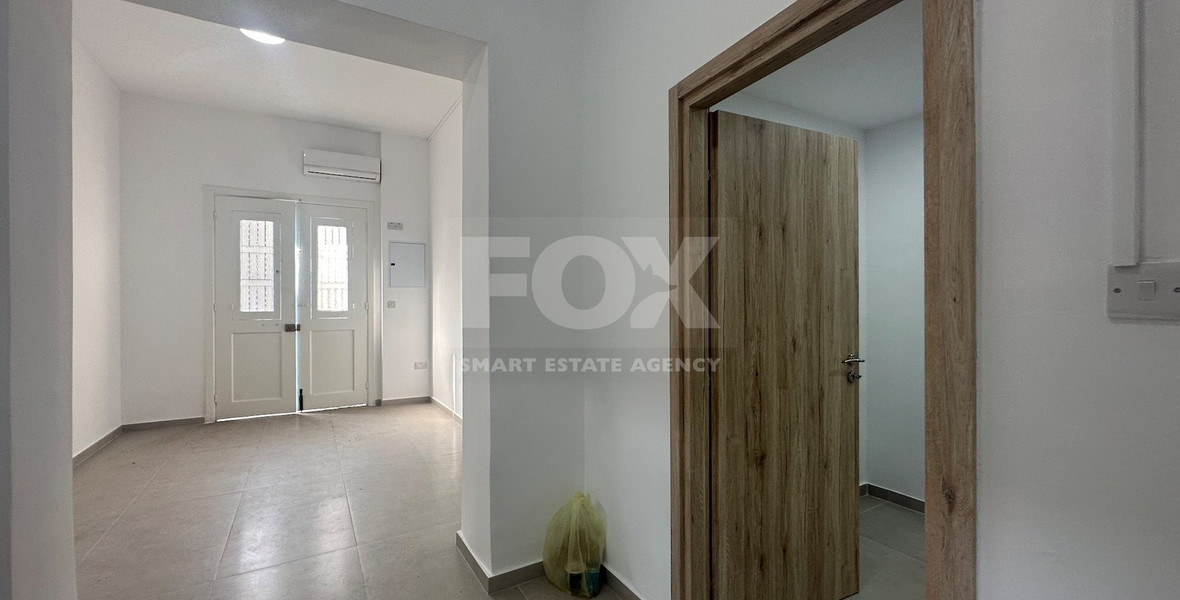 Exclusive Listing, Renovated Building offering ground level and upper level residences with garage in prime location Agia Zoni.