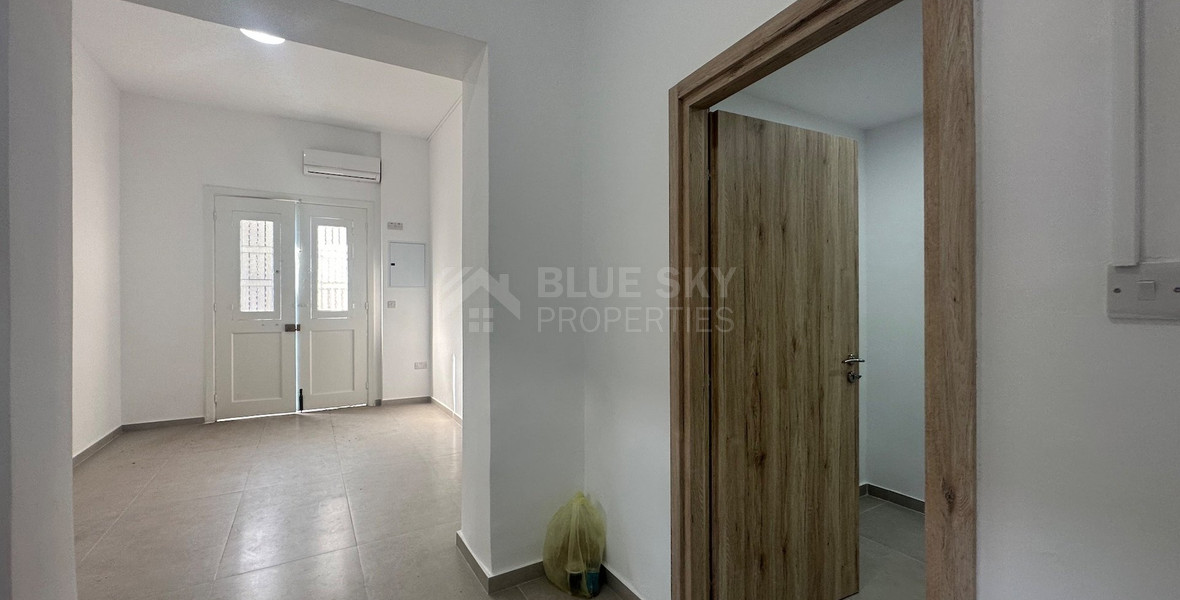 Exclusive Listing, Renovated Building offering ground level and upper level residences with garage in prime location Agia Zoni.