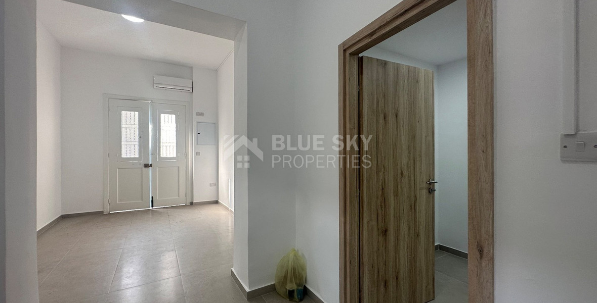 Exclusive Listing, Renovated Building offering ground level and upper level residences with garage in prime location Agia Zoni.