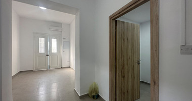 Exclusive Listing, Renovated Building offering ground level and upper level residences with garage in prime location Agia Zoni.