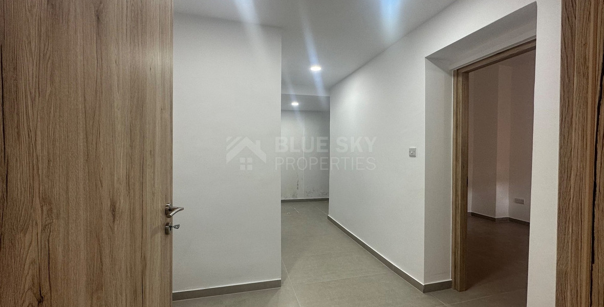 Exclusive Listing, Renovated Building offering ground level and upper level residences with garage in prime location Agia Zoni.