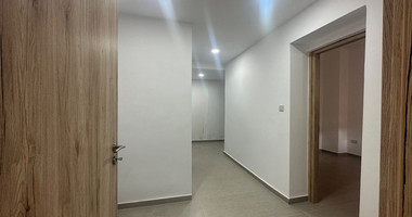 Exclusive Listing, Renovated Building offering ground level and upper level residences with garage in prime location Agia Zoni.