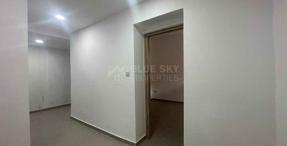 Exclusive Listing, Renovated Building offering ground level and upper level residences with garage in prime location Agia Zoni.