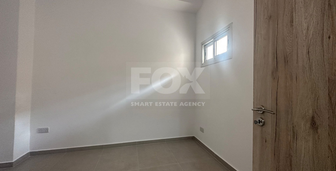 Exclusive Listing, Renovated Building offering ground level and upper level residences with garage in prime location Agia Zoni.