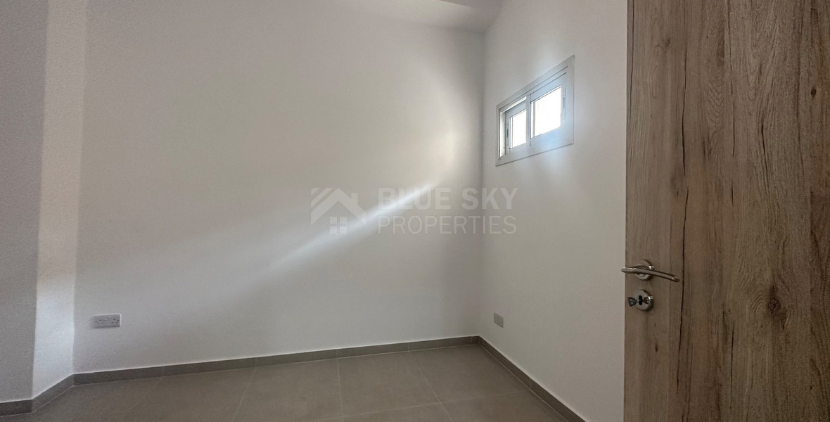 Exclusive Listing, Renovated Building offering ground level and upper level residences with garage in prime location Agia Zoni.