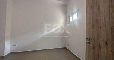 Exclusive Listing, Renovated Building offering ground level and upper level residences with garage in prime location Agia Zoni.