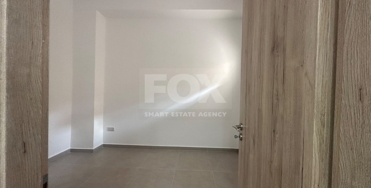 Exclusive Listing, Renovated Building offering ground level and upper level residences with garage in prime location Agia Zoni.