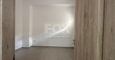 Exclusive Listing, Renovated Building offering ground level and upper level residences with garage in prime location Agia Zoni.