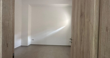 Exclusive Listing, Renovated Building offering ground level and upper level residences with garage in prime location Agia Zoni.
