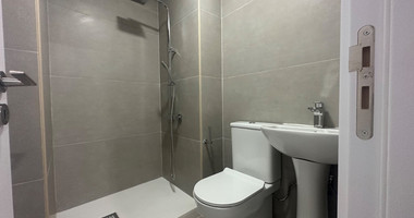 Exclusive Listing, Renovated Building offering ground level and upper level residences with garage in prime location Agia Zoni.