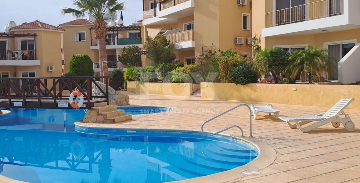 Charming Two-Bedroom Apartment with Large Communal Pool in Universal, Kato Paphos