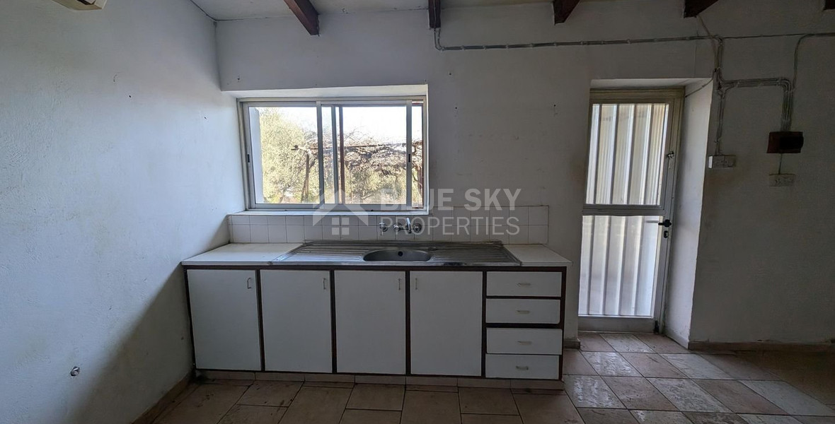 Three plots with stone-built house in Giolou, Paphos