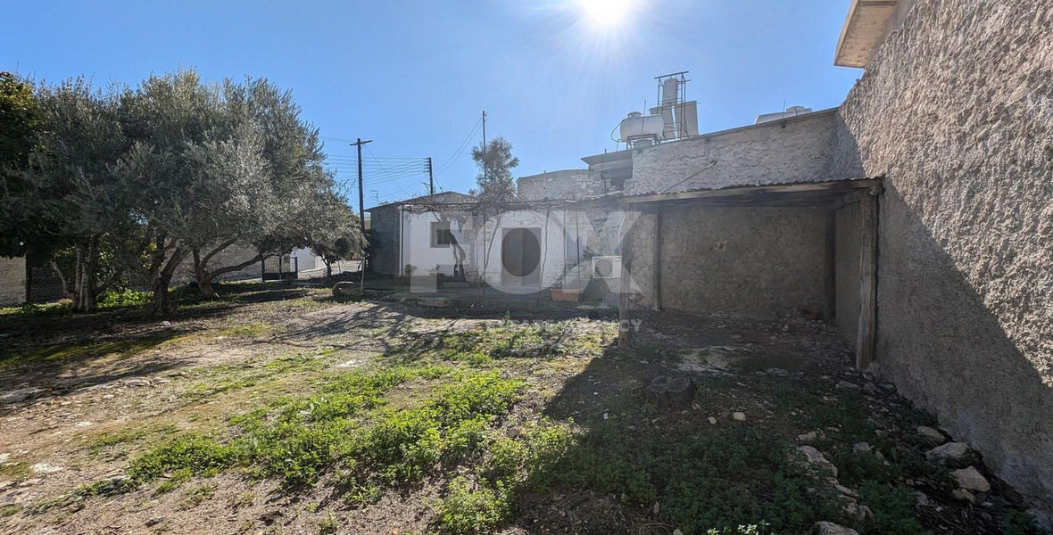 Three plots with stone-built house in Giolou, Paphos