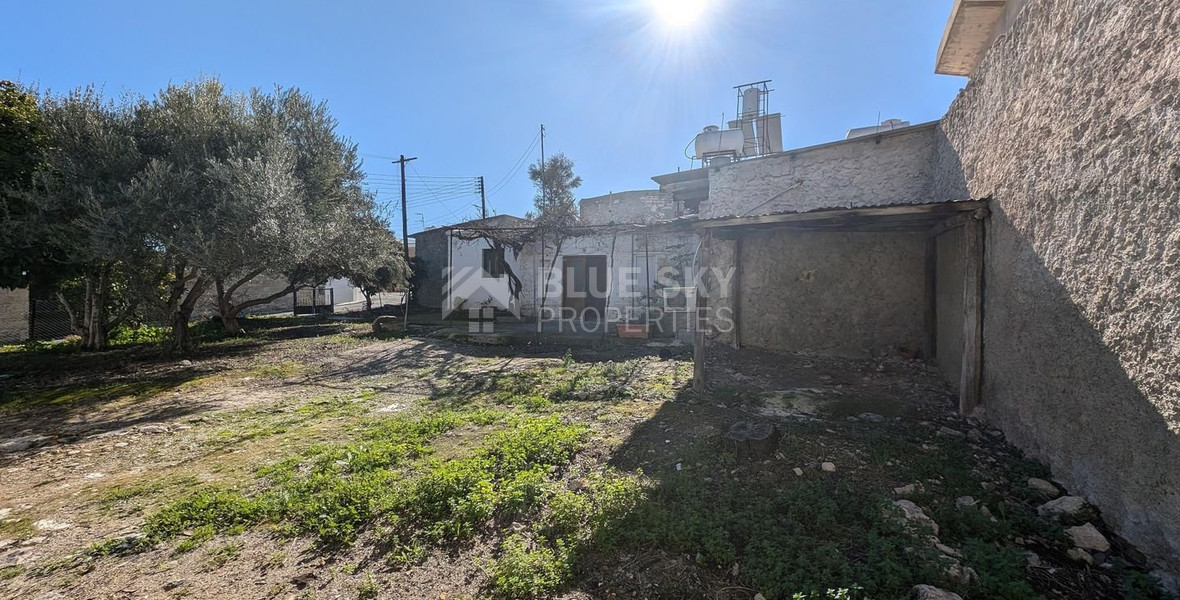 Three plots with stone-built house in Giolou, Paphos