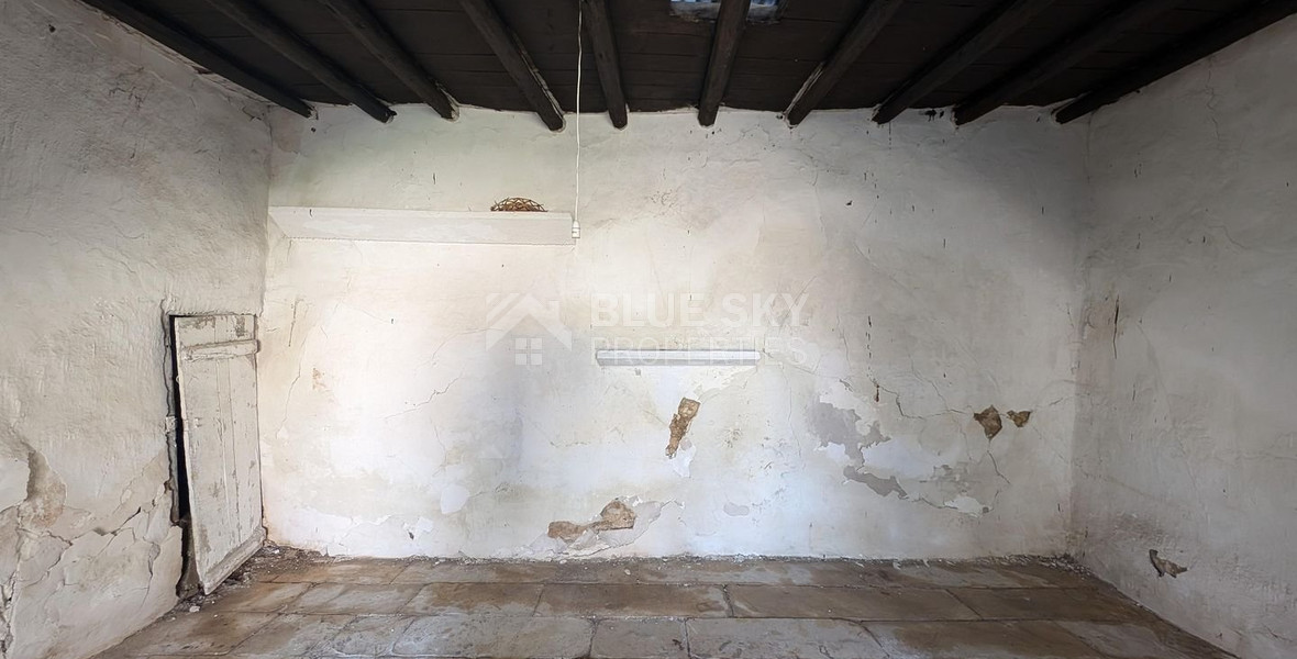 Three plots with stone-built house in Giolou, Paphos
