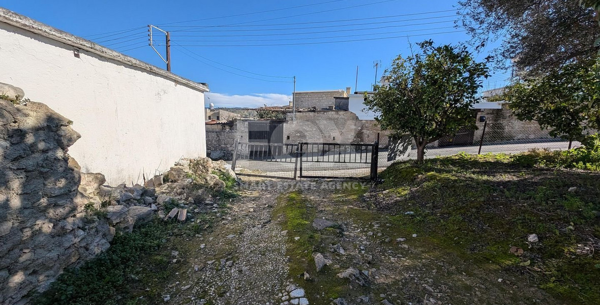 Three plots with stone-built house in Giolou, Paphos