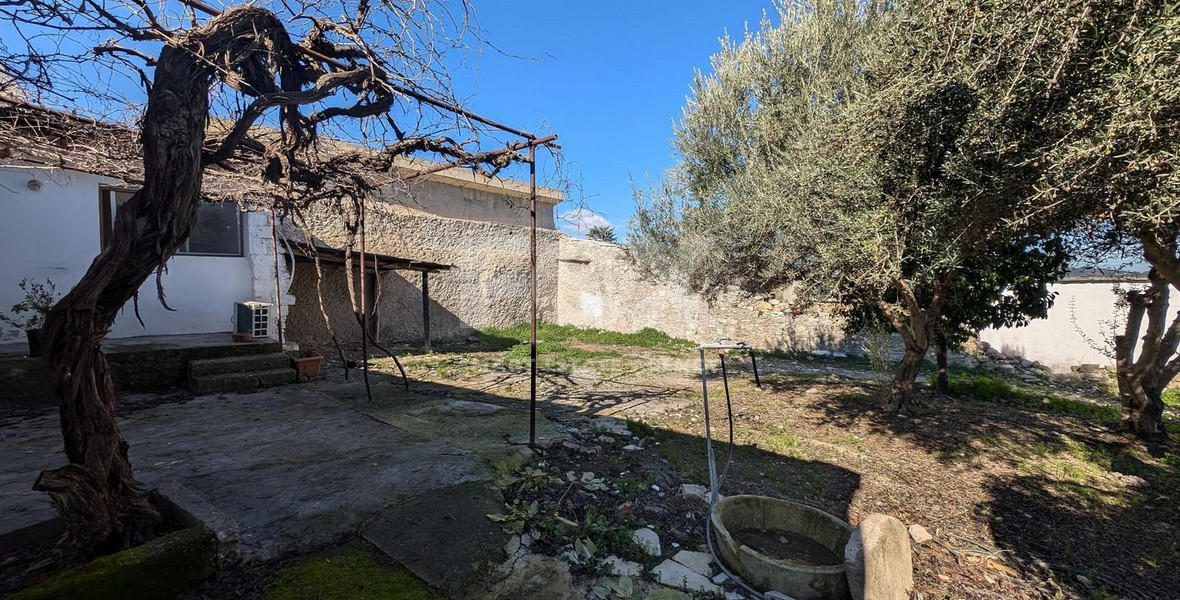 Three plots with stone-built house in Giolou, Paphos