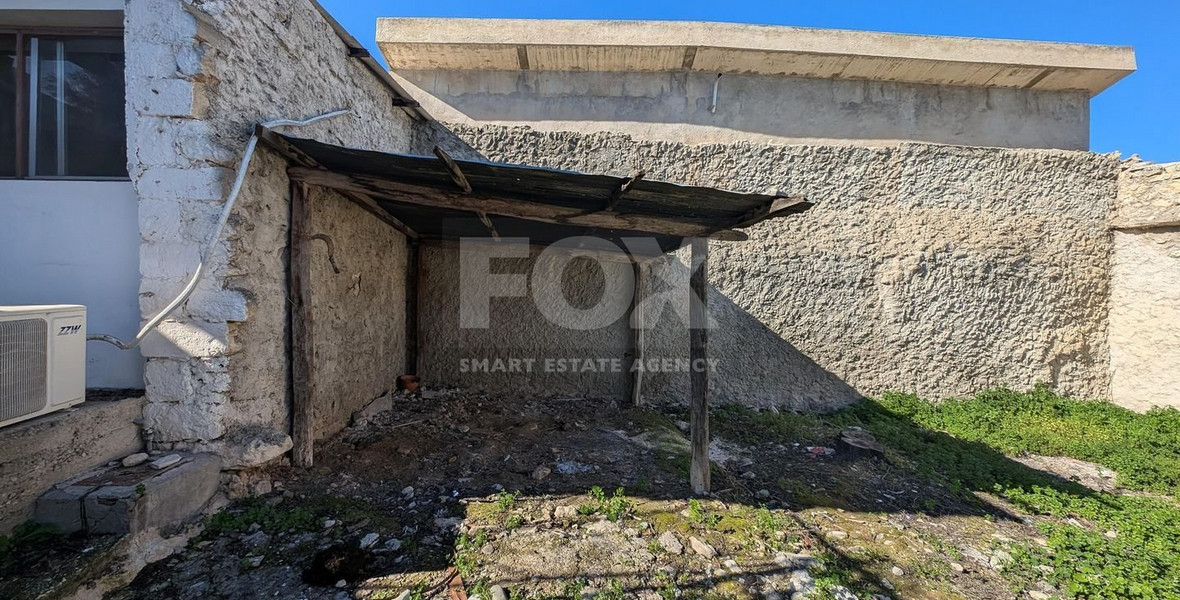 Three plots with stone-built house in Giolou, Paphos