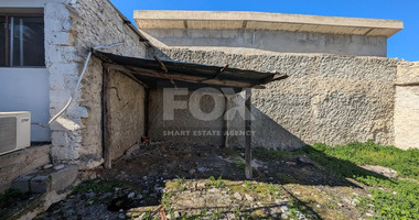 Three plots with stone-built house in Giolou, Paphos