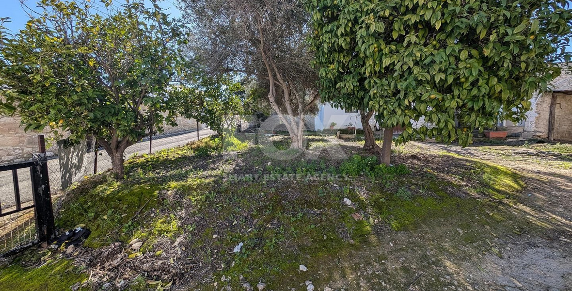 Three plots with stone-built house in Giolou, Paphos