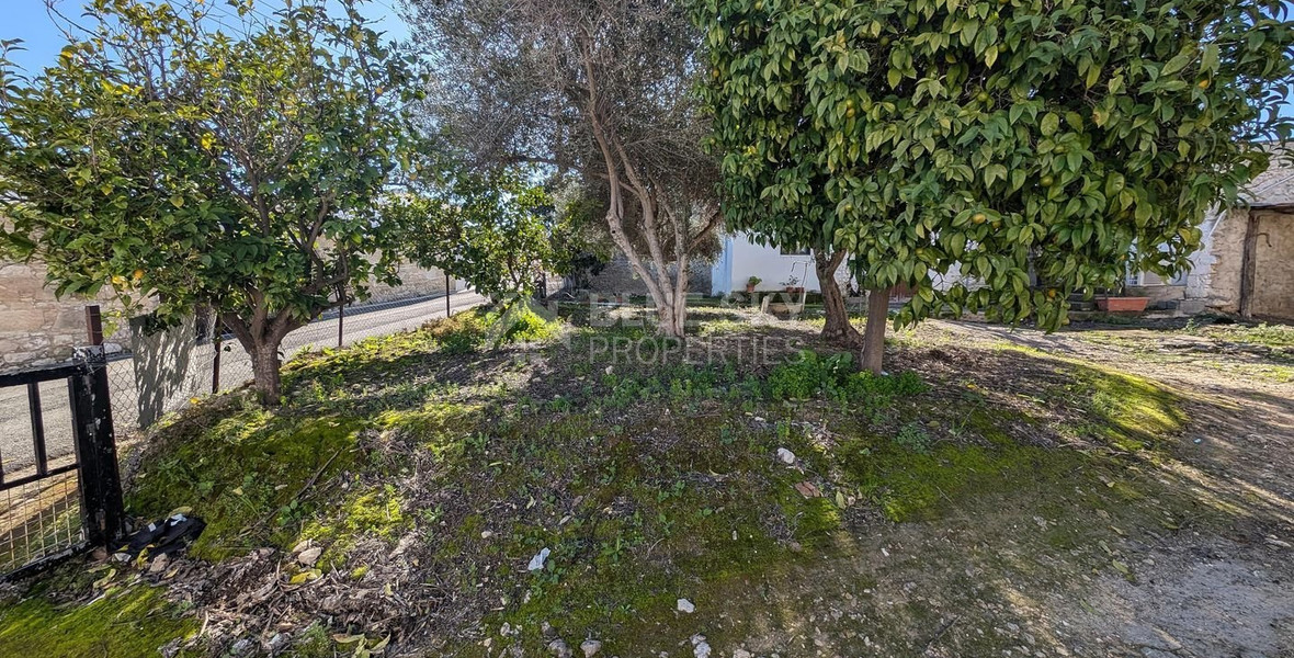 Three plots with stone-built house in Giolou, Paphos