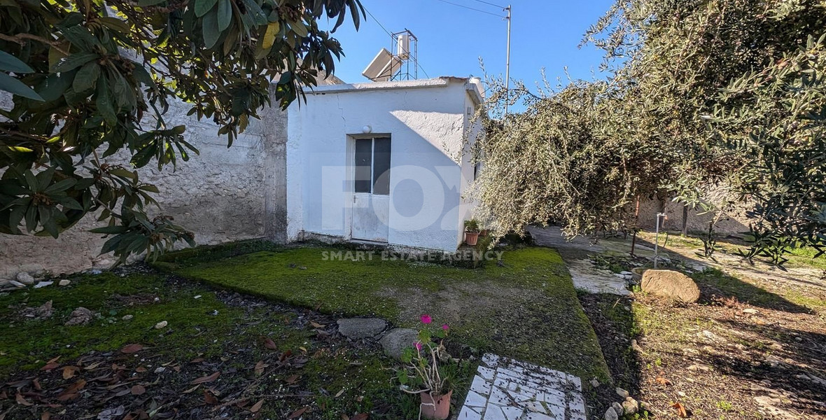 Three plots with stone-built house in Giolou, Paphos