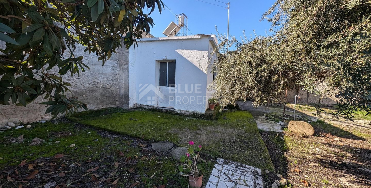 Three plots with stone-built house in Giolou, Paphos