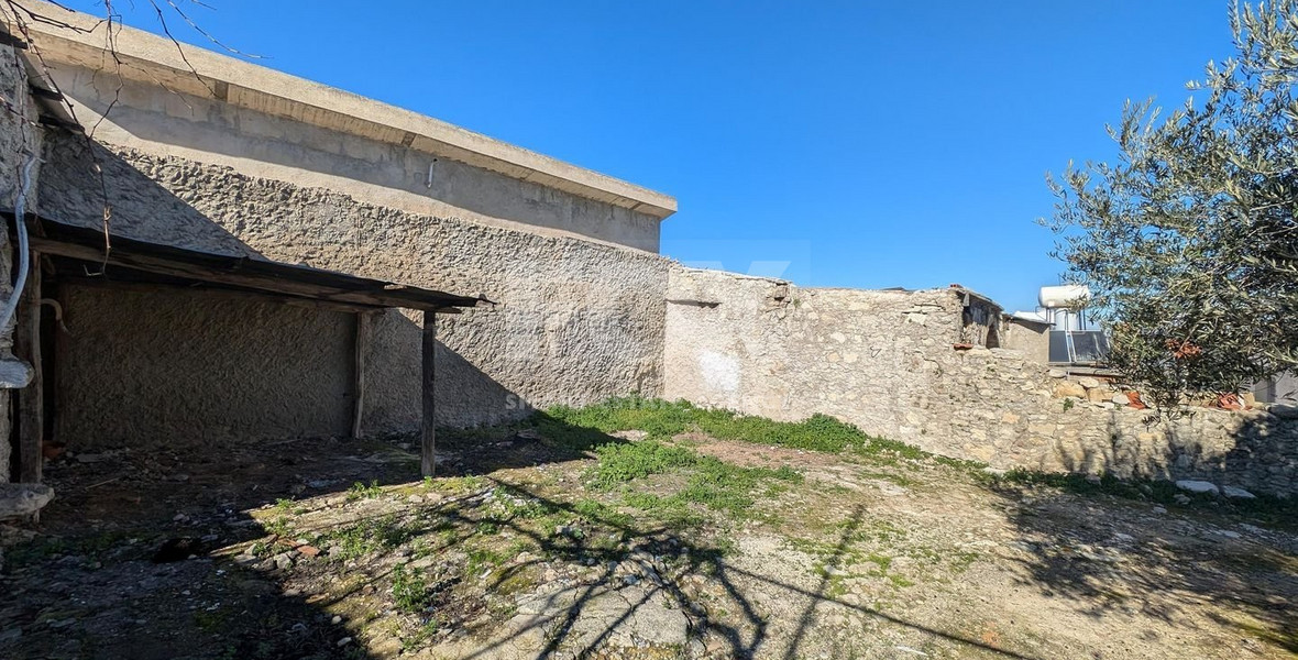 Three plots with stone-built house in Giolou, Paphos