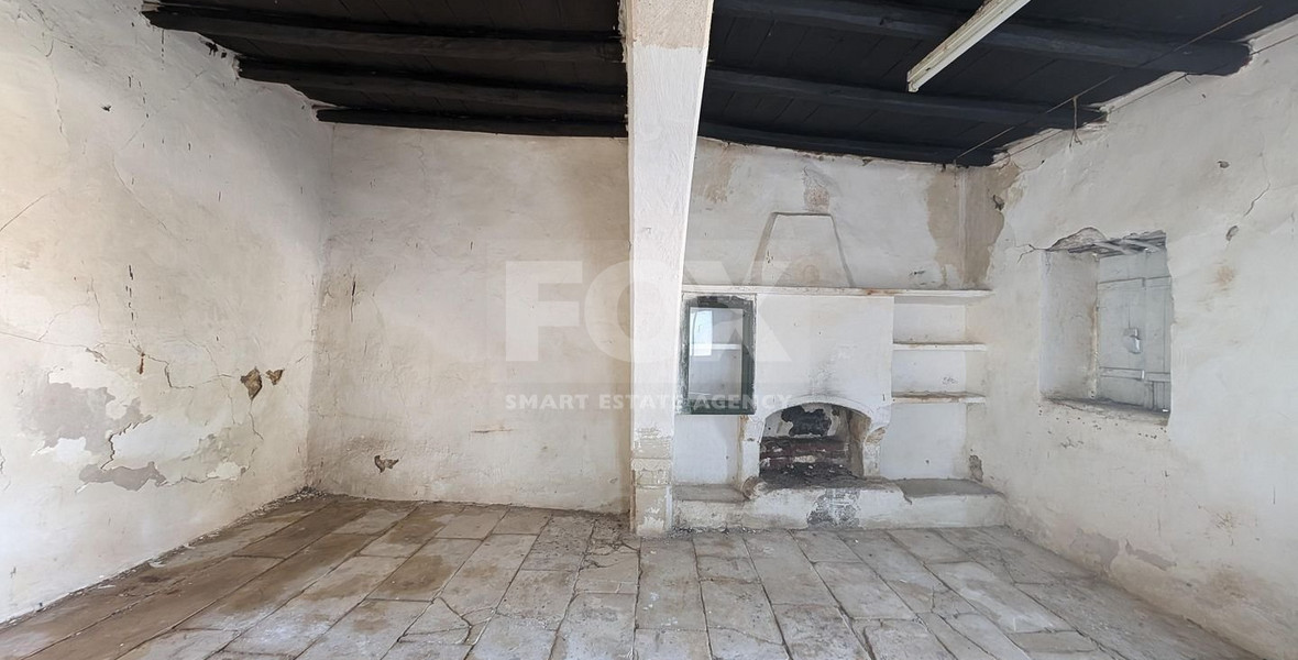 Three plots with stone-built house in Giolou, Paphos