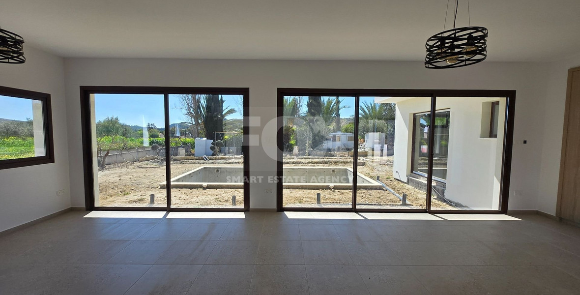 Luxury Three-Bedroom Villa for Rent in Pissouri: Brand-New in a Gated Complex with Gardens & Country Views