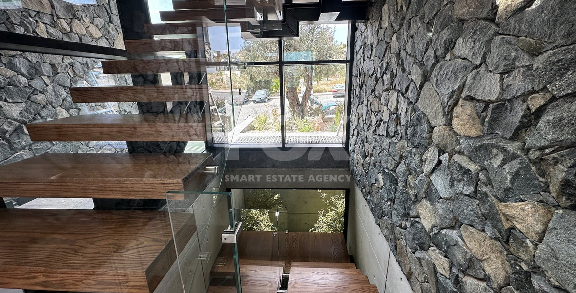 High Quality Villa custom built for sale in a quiet residential area with panoramic views in Agios Athanasios