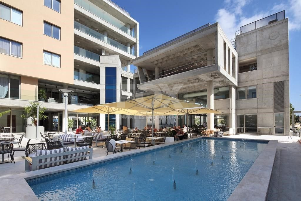 Three-bedroom apartment is available for sale in Universal, Paphos