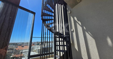 Modern Two-Bedroom Penthouse for sale in Tsirio: with Roof Garden & Views