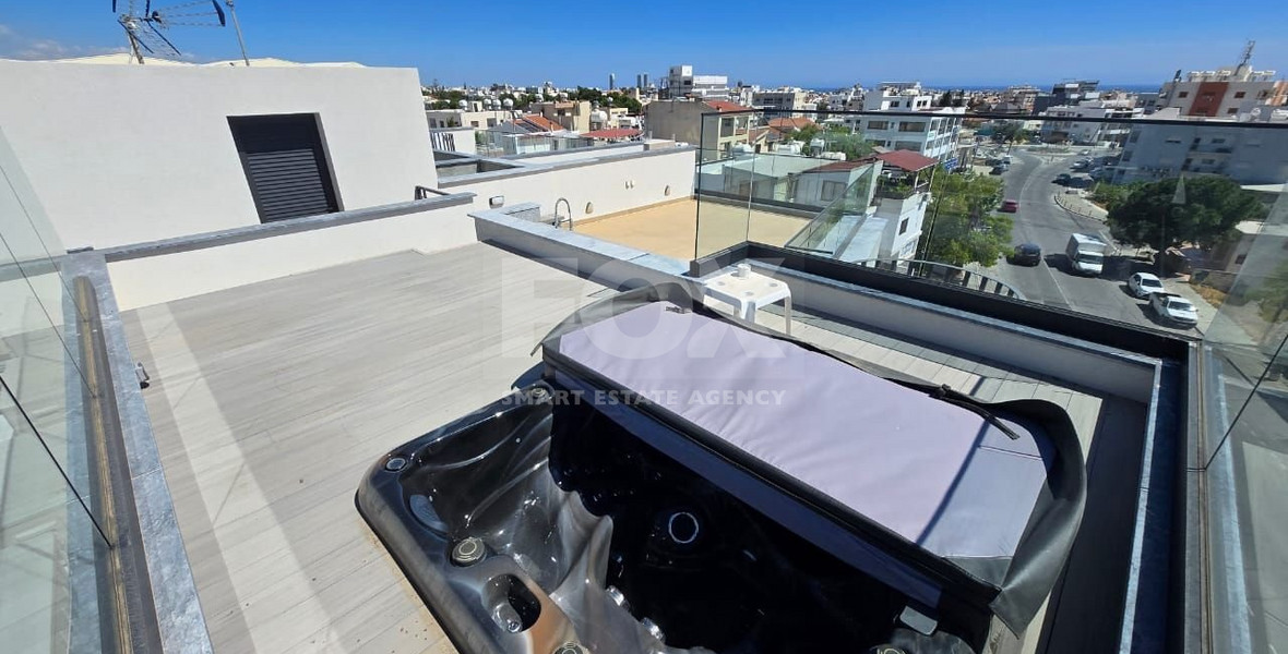 Modern Two-Bedroom Penthouse for sale in Tsirio: with Roof Garden & Views