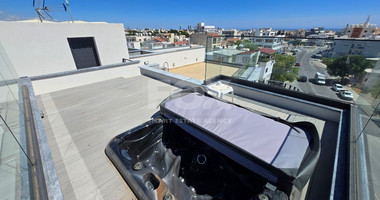 Modern Two-Bedroom Penthouse for sale in Tsirio: with Roof Garden & Views