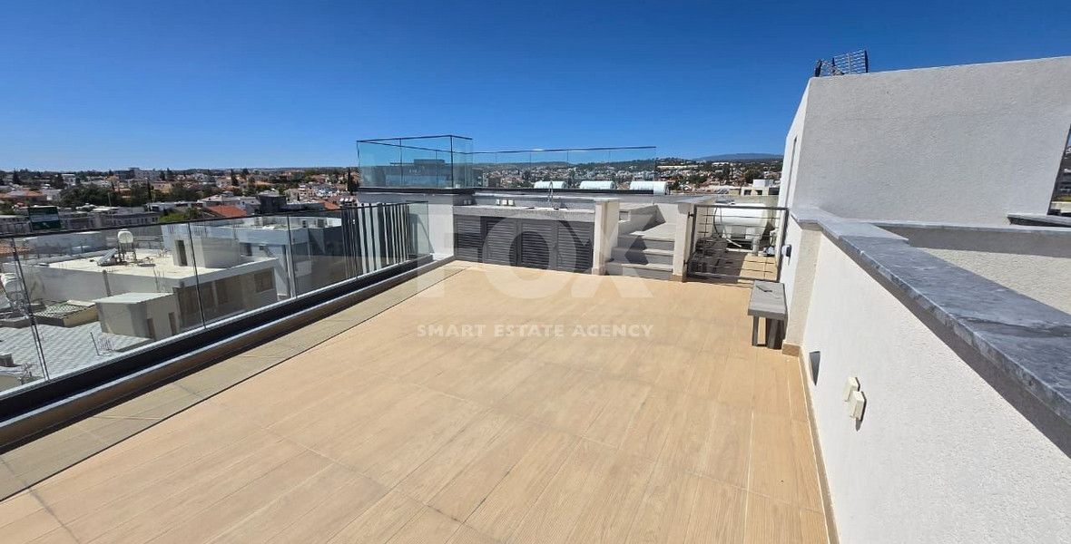 Modern Two-Bedroom Penthouse for sale in Tsirio: with Roof Garden & Views