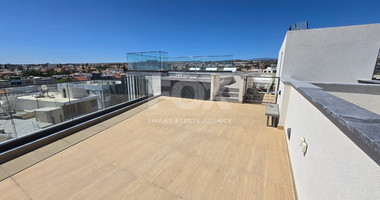Modern Two-Bedroom Penthouse for sale in Tsirio: with Roof Garden & Views