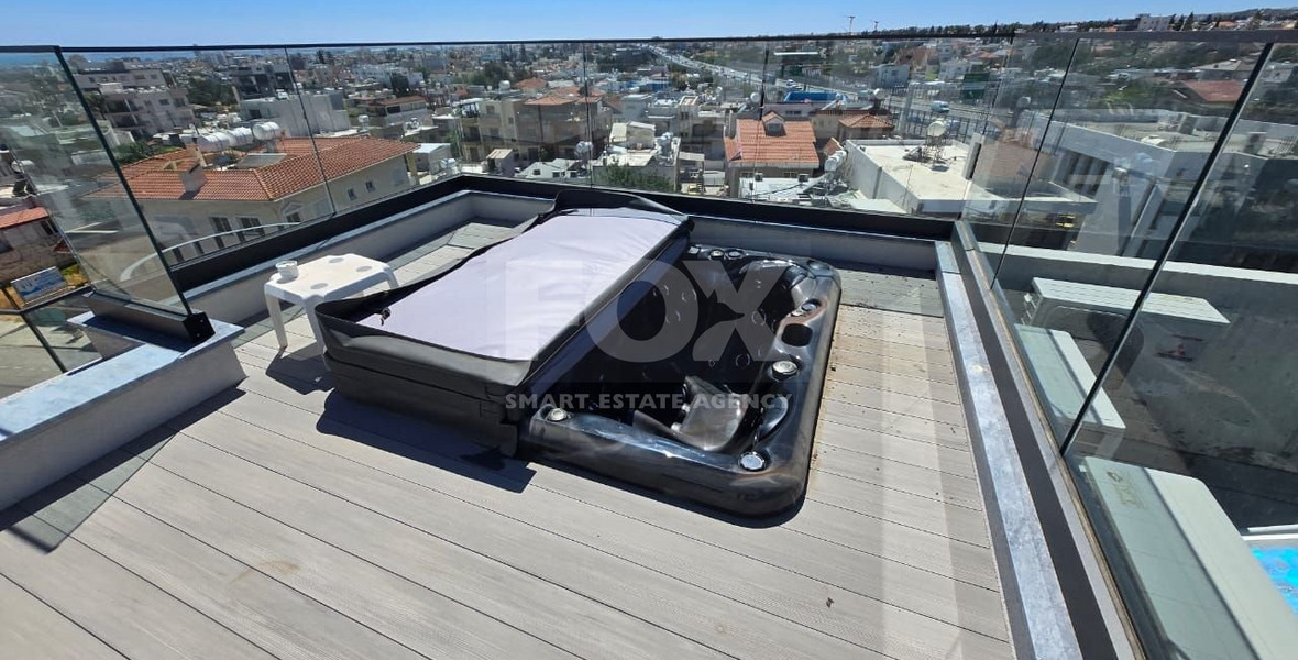 Modern Two-Bedroom Penthouse for sale in Tsirio: with Roof Garden & Views