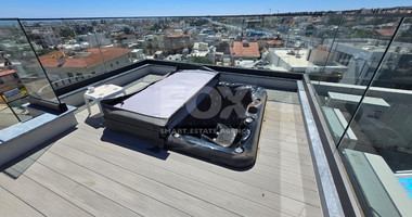 Modern Two-Bedroom Penthouse for sale in Tsirio: with Roof Garden & Views