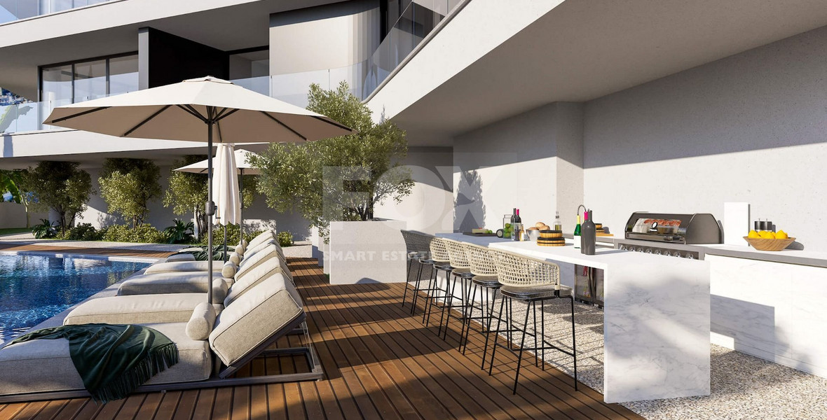 Top floor three  bedroom apartment with roof garden for sale in Potamos Germasogeias, Limassol