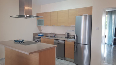 Fully furnished luxury 2 bedroom apartment with private garden for rent in Agios Tychonas