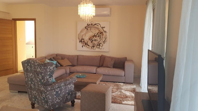 Fully furnished luxury 2 bedroom apartment with private garden for rent in Agios Tychonas