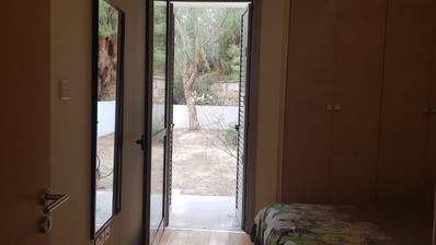 Fully furnished luxury 2 bedroom apartment with private garden for rent in Agios Tychonas