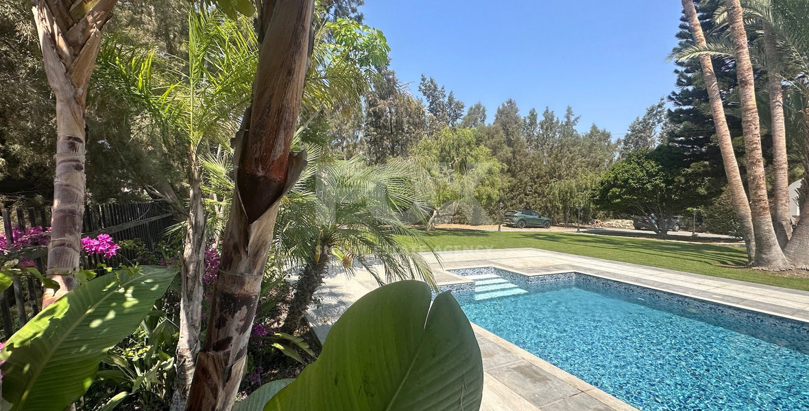 RENT: LUXURY 5 BEDROOM UNFURNISHED VILLA IN THE POTAMOS GERMASOGIA AREA WITH OUTSTANDING GARDENS AND SWIMMING POOL.