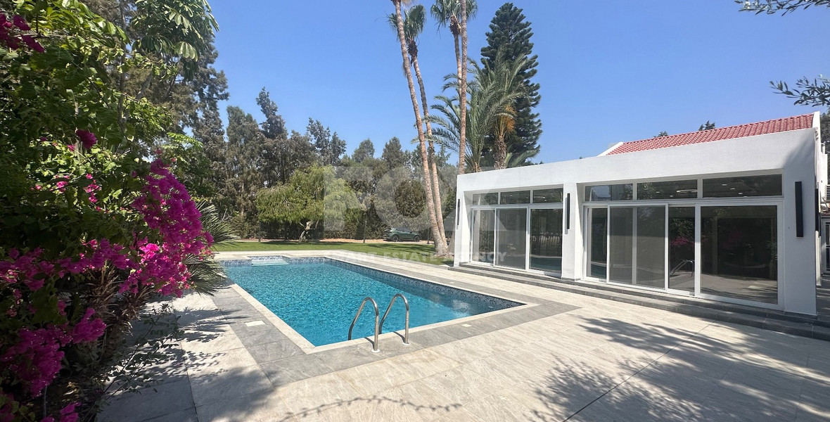 RENT: LUXURY 5 BEDROOM UNFURNISHED VILLA IN THE POTAMOS GERMASOGIA AREA WITH OUTSTANDING GARDENS AND SWIMMING POOL.