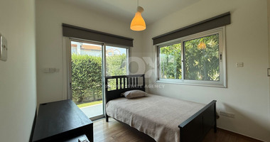 FOR SALE THREE BEDROOM GROUND FLOOR APARTMENT WITH GARDEN AND COMMUNAL SWIMMING POOL.
