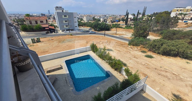 Two bedroom spacious apartment with communal swimming pool for rent in Agios Athanasios, Limassol