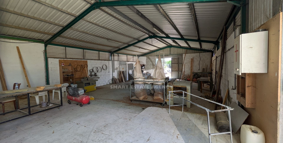 Spacious Warehouse with Large Plot in Agia Varvara, Paphos for sale .