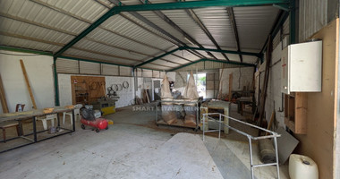 Spacious Warehouse with Large Plot in Agia Varvara, Paphos for sale .